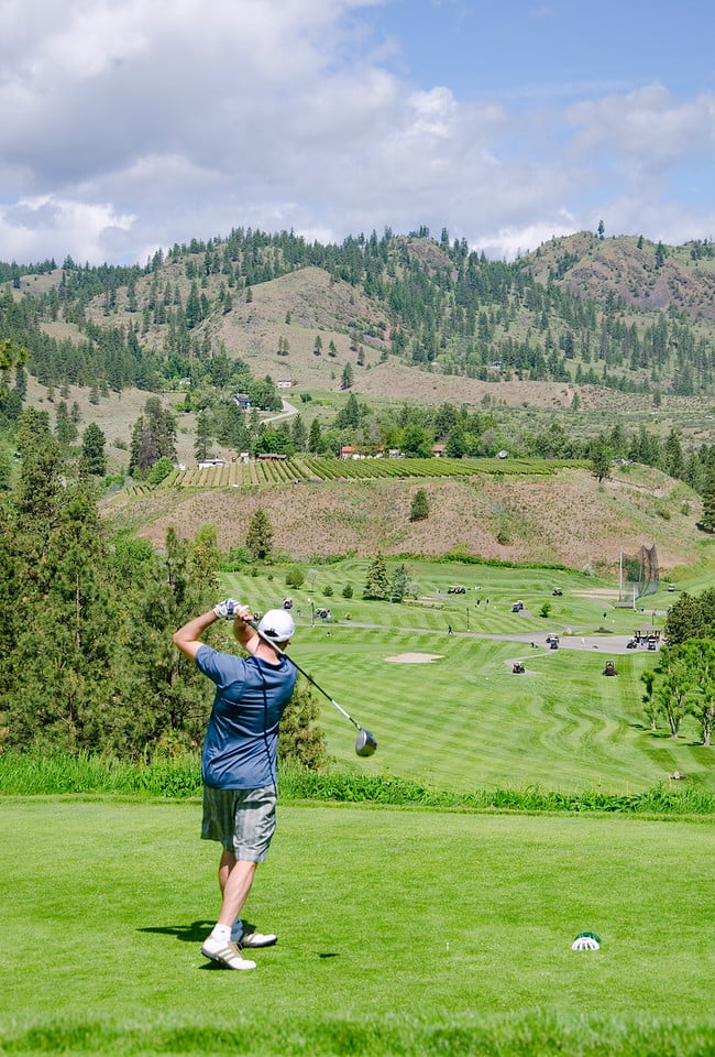 Follow thru of tee shot at Fairview Mountain Golf Club